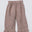 A pair of toddler's wide-leg linen pants in a dusty rose-brown color, featuring an elastic waistband and ruffled hems, laid flat against a light gray background.